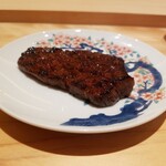 江戸焼肉 - 純血但馬万葉牛のリブ巻き　ホルモン味噌ベースのもみだれ
