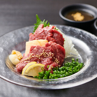 A variety of unique Horse Meat Dishes such as Gyoza / Dumpling, gyoza, and horsemeat sausage