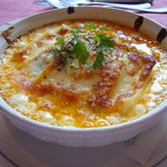 ポコアポコ - 料理写真:オリジナルのホワイトソースとミートソースとチーズがベストマッチ！