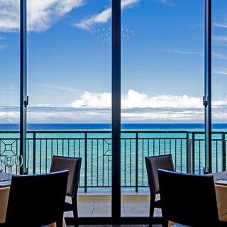 Enjoy casual French cuisine while looking out at Tiger Beach spreading out in front of you.