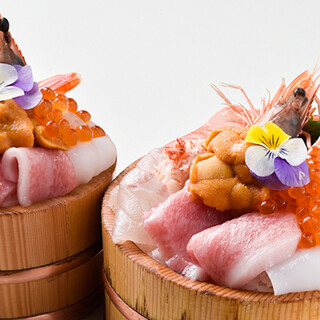 Photography is required! Enjoy the luxurious Seafood Bowl overflowing from the bucket