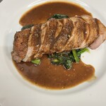 Grilled duck breast, green pepper red wine sauce