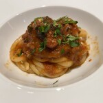 三和 - 真蛸のピリ辛トマト煮込みのピチ