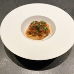 三和 - 真蛸のピリ辛トマト煮込みのピチ