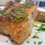 オステリア チロ - 三重県産骨付スペアリブとサルシッチャの香草焼き