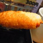 Kushikatsu Dengana - 二度浸け禁止のソースに浸けて