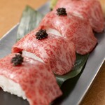 Grilled domestic beef short ribs Sushi topped with caviar (4 pieces)