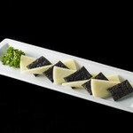 Manchego (sheep's milk cheese) served with bamboo charcoal crackers