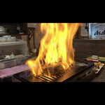 同心亭 - ブランデーをかけて表面だけフランベ。豪快です！