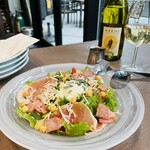 Caesar salad with Prosciutto and warm egg