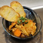 Beef tendon stew in tomato