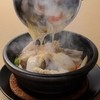 紅鶴 - 料理写真:熱々で焼ける音も楽しみのひとつ！　『紅鶴式おこげ』