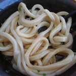 198852634 - スタミナぶっかけうどんを混ぜ混ぜ