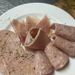 Assortment of 4 types of Prosciutto and cold ham