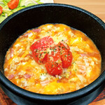 Quattro cheese risotto made with ripe tomatoes!
