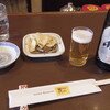 驪山 - 料理写真:何はともあれ、まずはビールです♪お通しでポテチとかぼちゃの種が！が出てきます