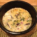 くおくお。 - するめいか入りとろろの石焼おやき　※投入後