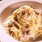 Carbonara topped with warm egg