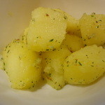 美酒肴房 松圭 - 新じゃが煮っ転がしバターとハーブソルト風味