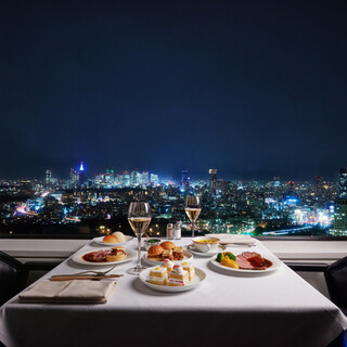 ``Glittering panoramic night view of the city'' seen from a great location