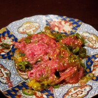 焼肉 にくだらけ - 田村牛のとろける炙りユッケ