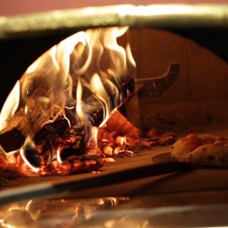 Authentic PIZZA baked in a wood-fired oven