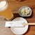焼彩沖縄家 ゆんたく - 料理写真:沖縄シークヮーサー生ビール ＆ お通し