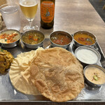 ナンディニ 虎ノ門店 - スパイシーレベルをHOTでお願いしたので、チリパウダーが小さじ1／2ほどのっています。