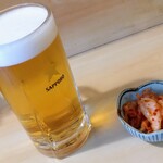 Tompei - 生ビールとお通し（今日はキムチ）