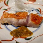 温石 - 金目鯛 実山椒醤油のソース