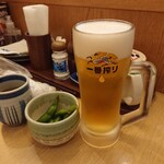 Ton Kyu - 生中とサービスのお通しとして枝豆が付いてきました♪