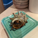 焼はまぐりstand LINKS UMEDA - サザエのガーリック焼き。