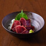 Grilled horse fin sashimi