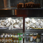 ヴァカンツァ - ケースの中に牡蠣がたくさん