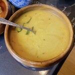 Minami kitchen - サービスで出てくるココナッツミルクのカレースープ