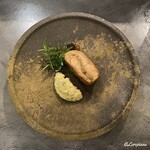 カーサ・デル・チーボ - 蕗の薹のパン粉を挟んだ桜鱒のコトレッタ