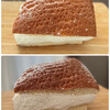 小松パン店 - 料理写真:開封後。縦は約15cm、横は約9.5cm、
高さは約8cmほど！

たっぷりのバタークリームが、溢れそうな勢いでサンドされています！:(；ﾞﾟ'ωﾟ'):