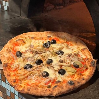 Neapolitan pizza made with authentic ingredients and baked in a traditional oven