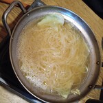 地鶏鍋屋だんだん - ラーメン投入