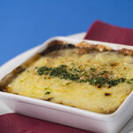 Turkish Moussaka Oven-baked minced meat, eggplant, and potatoes