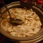 だるま - 料理写真:〆の鍋は、ご飯とうどんのコラボレーション！知ってるけど、知らない未知の食感でしたが、旨味の凝縮された鍋で〆れるのは最高です！