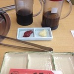 Yakiniku Kurose - 店特製たれかポン酢
                        ニンニクとコチジャンが薬味に付きます