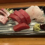 Three pieces of sashimi