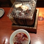 魚 しんのすけ - お通し（イカの炭火焼）