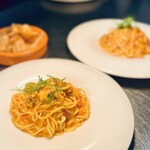 Creamy pasta with fresh sea urchin and tomato
