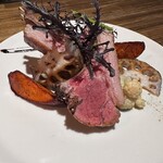 Grilled Australian lamb bone-in loin with the flavor of Southern Italy