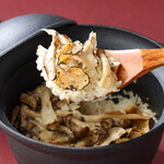 ``Truffle-scented mushroom rice'' cooked in a clay pot in a Western style