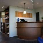 フラテッロ・ディ・ミクニ - キャッシャー周り。三國シェフと堀川シェフの写真があったり。