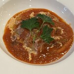 Young chicken stew in tomato