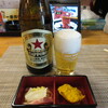 魚と肉と地酒 マルキ商店 - 瓶ビールとお通し